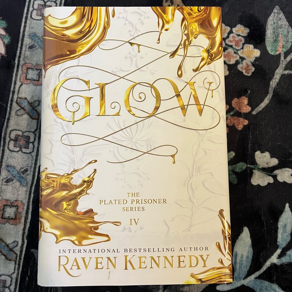 Glow by Raven Kennedy Hardcover Book
